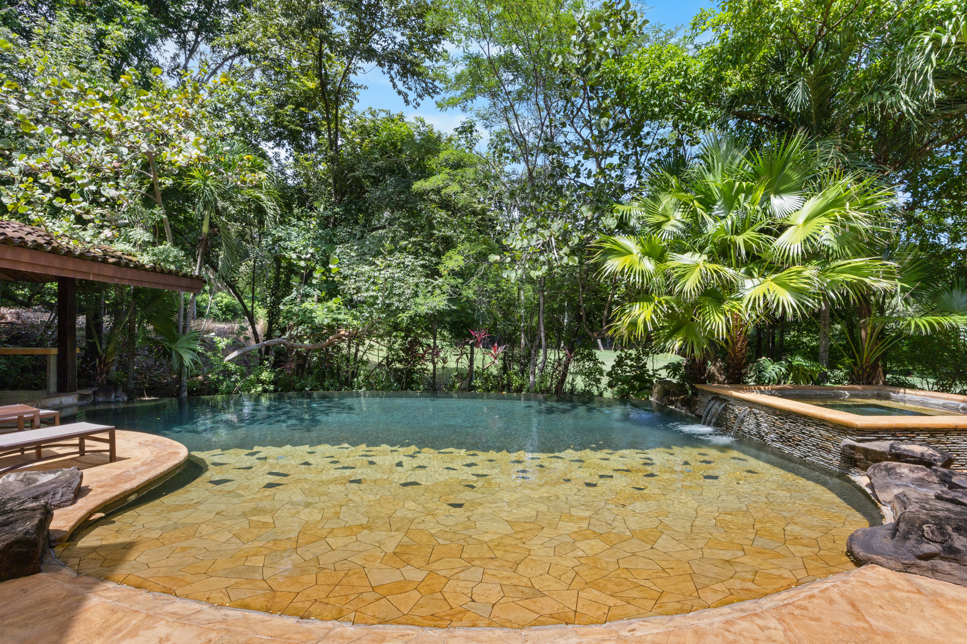 The beach-style pool entrance at Villa Conchal